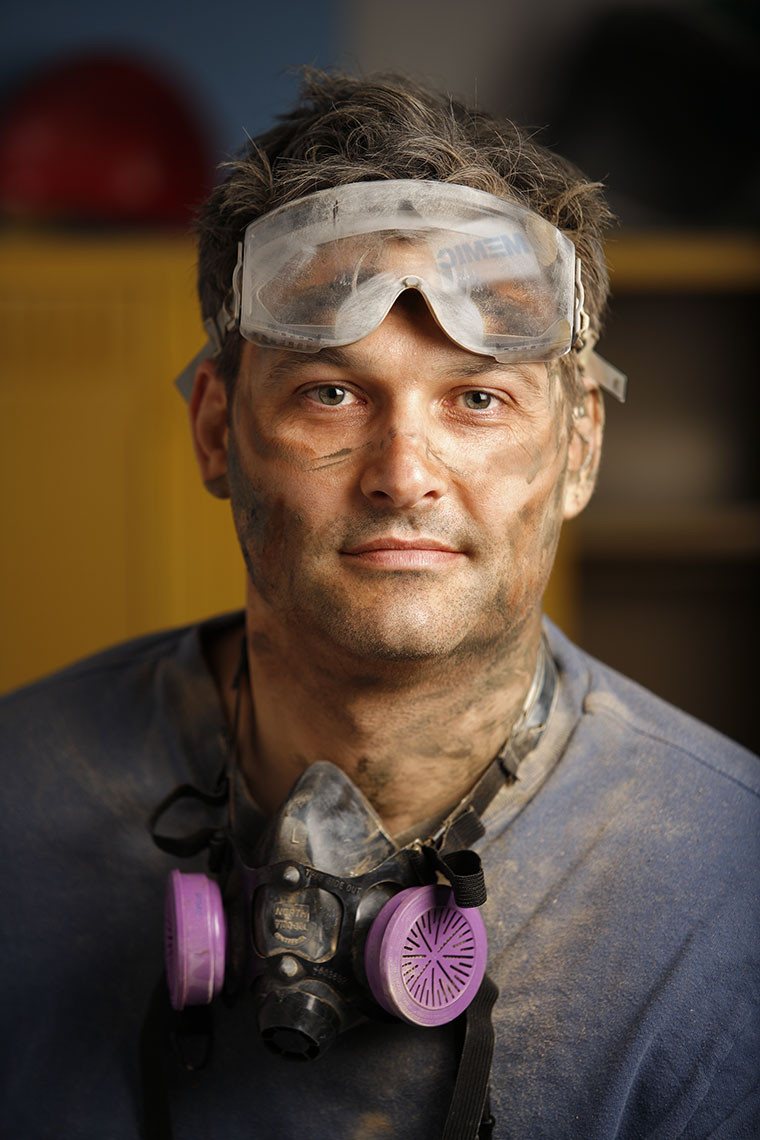 Blue collar worker for cover of MEMIC  Annual Report